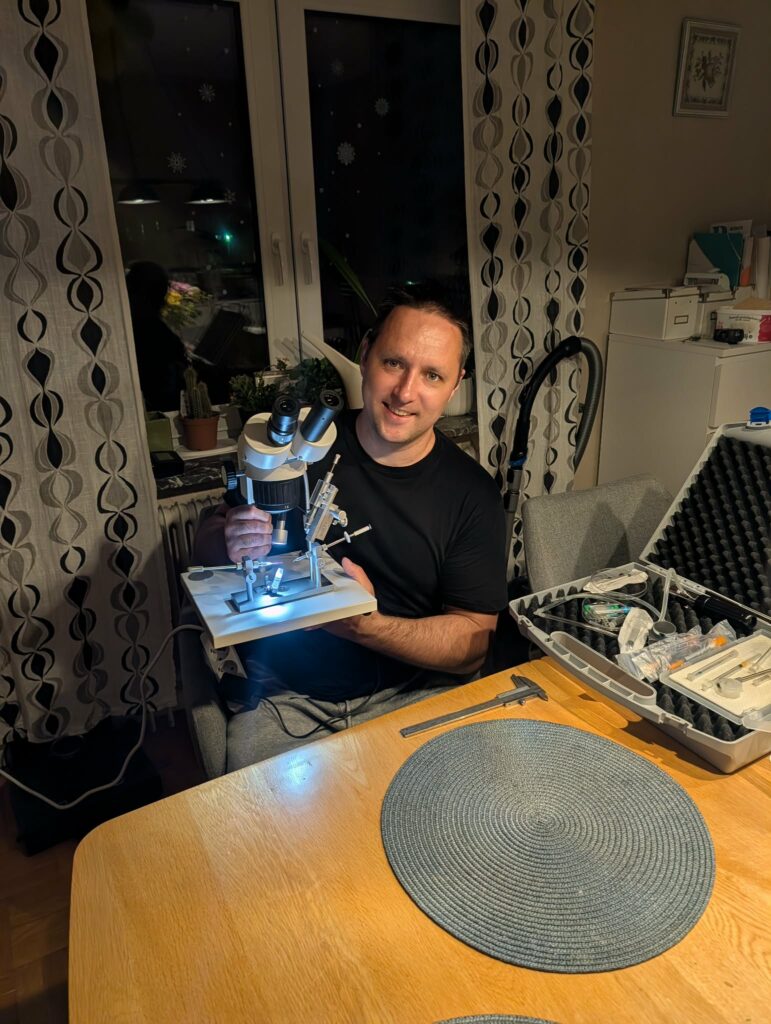 Aleksei at the instrumental insemination equipment